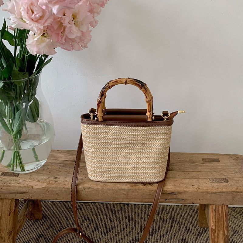 New bag for summer 2025, niche slanted designer, women's premium retro texture, hand-held straw bucket bag, women's armpit bag