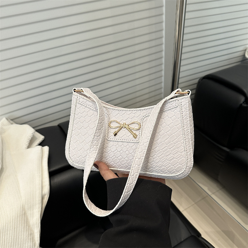 Sweet Girl Heart New Free Delivery Designer Bag Weaving Pattern 2025 Spring New Simple Fashion Western Luxury Bag Style Bow Armband Shoulder Bag Premi