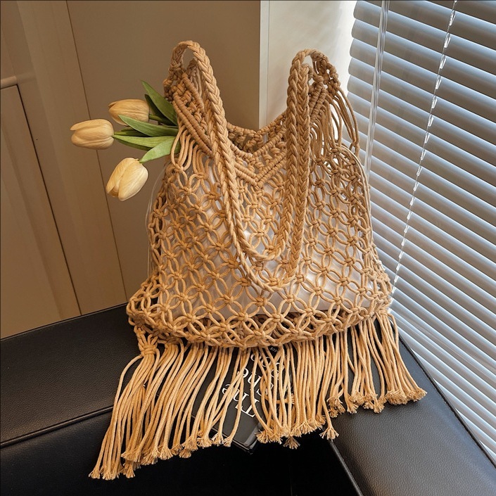 Hollow out cotton thread for women 2025 summer new tassel grass woven bag, vacation style beach versatile armpit shoulder bag