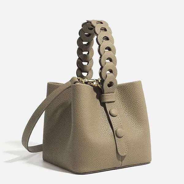 New Hollowed Out Hand-Held Soft Leather Lychee Pattern Drawstring Bucket Bag, Fashionable And Versatile Women's Bag