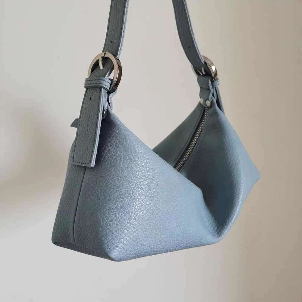 High end versatile armpit soft leather small women's dumpling 2025 autumn and winter French niche crossbody crescent bag