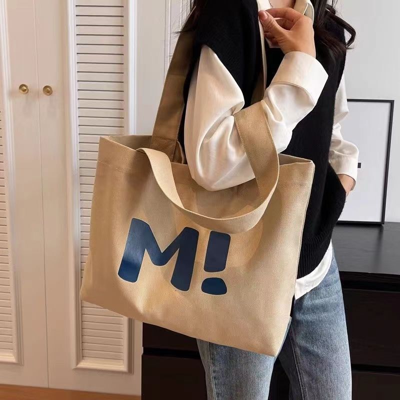 Canvas for women, large capacity, sturdy supermarket shopping bag, simple and versatile. 2024 new single shoulder tote bag