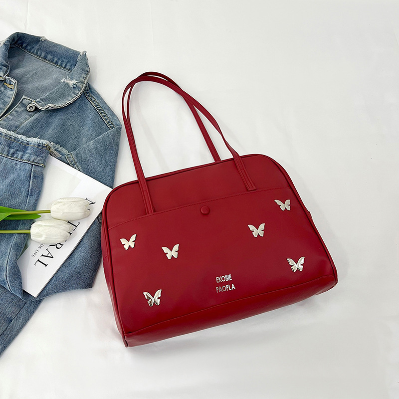 2025 Spring And Summer New Tote Fashion Trend New Free Delivery Designer Bag Pillow Handheld Shoulder This Year's Luxury Bag Popular Women's
