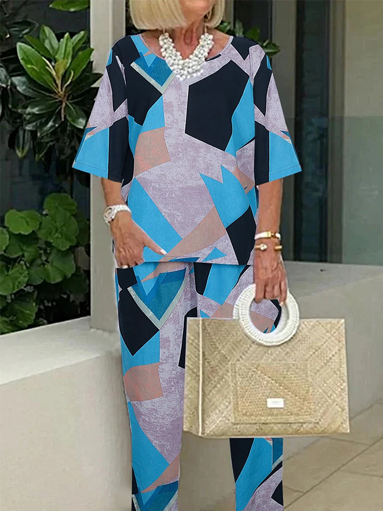 plus Size 2025 Womens Short Sleeve Pleated Suit Irregular Patterned Shirt Wide Leg Pants 2 Piece Fashion Sweatshirt Set 250514