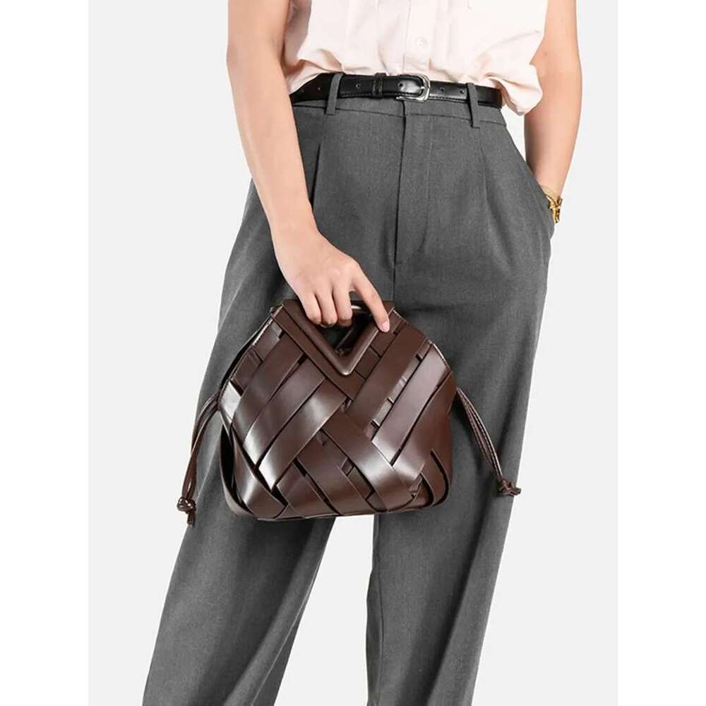 New Design Fashion Woven Genuine Leather Handbag French Portable Retro Trend Shoulder Hollow Out Bucket Bag