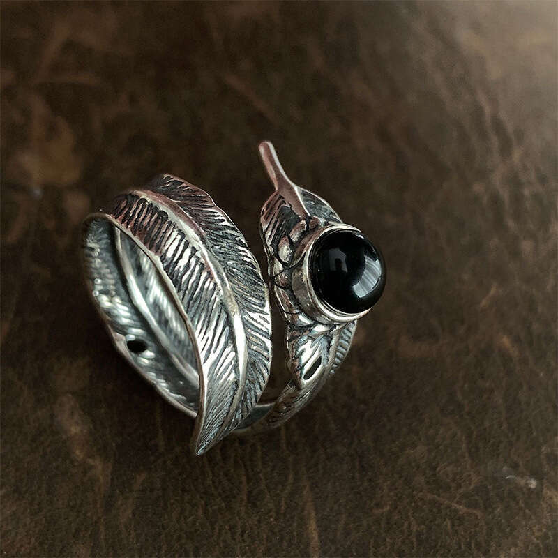 Hot selling Pupil Feather Open End Ring with Cold and Individualized Design