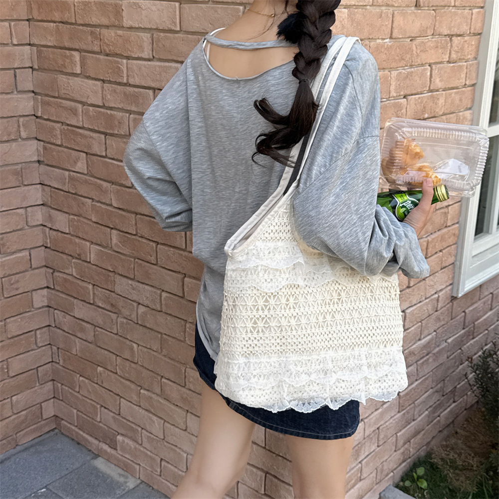 2025 new spring and summer leisure vacation fairy shaped lace mesh underarm large capacity single shoulder women's bag beach vacation bag trend h