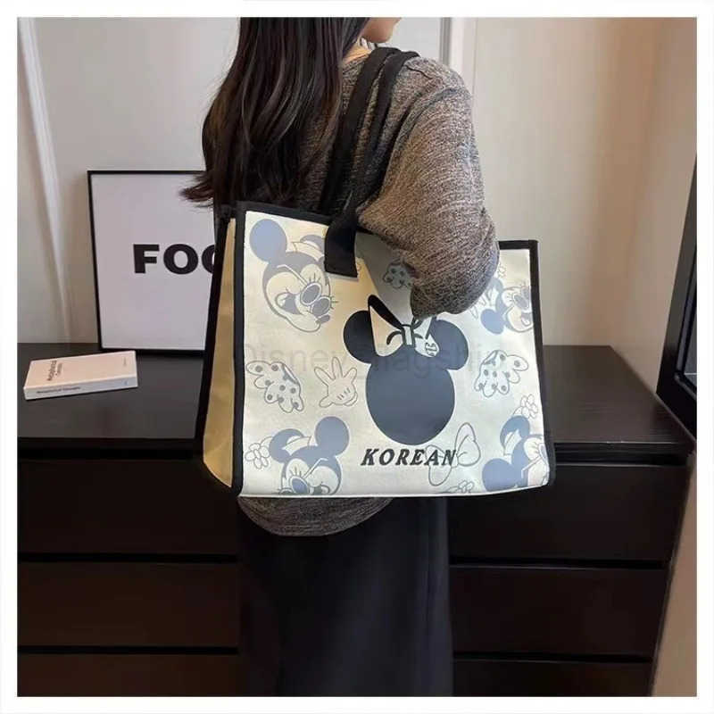 Disney 2024 New Mickey and Minnie Canvas Shoulder Bag Commuter Fashion Tote Bag Large Capacity Handbag Mommy BagXJ250515
