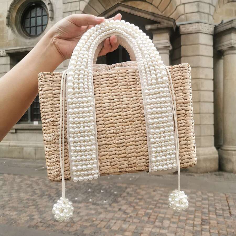 2025 Free Shipping New Women's Designer Elegant Knitted Beaded Straw Bag Women's Bohemian Knitted Large Handbag Holiday Leisure Beach Bag