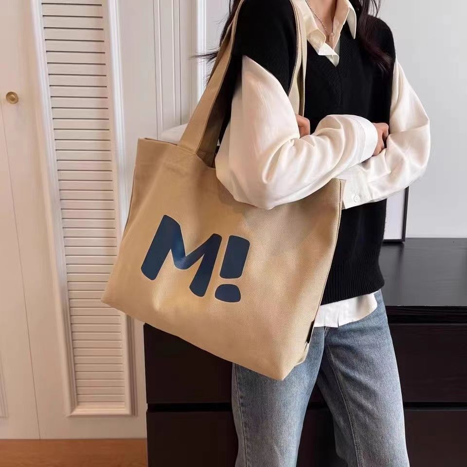 Canvas for women, large capacity, sturdy supermarket shopping bag, simple and versatile. 2024 new single shoulder tote bag