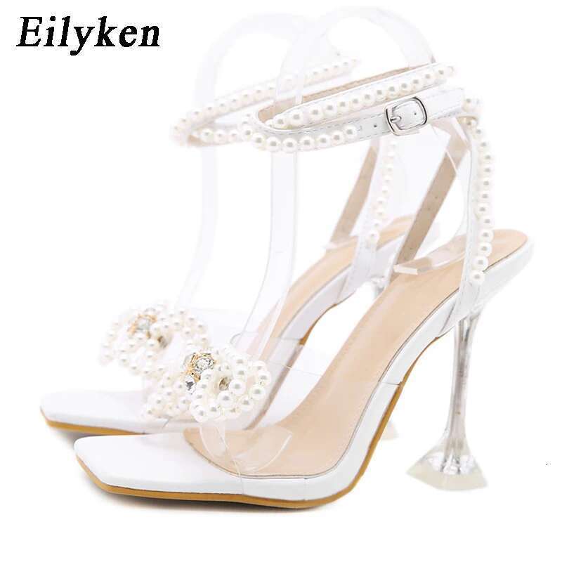 Eilyken New Women Sandals 2025 Summer Sexy Perspex Crystal High Heels Party Wedding Shoes Square Toe Pearls String Bowknot Pumps