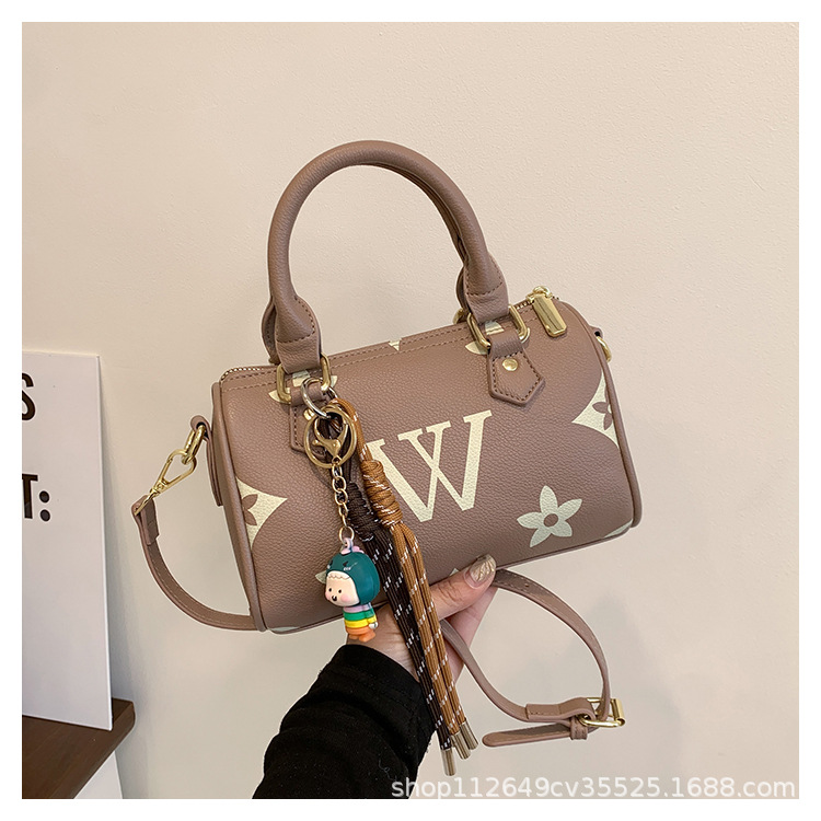 Premium sense of printing handbag 2025 new retro old flower letters women's bag hundred crossbody bag trend pillow bag