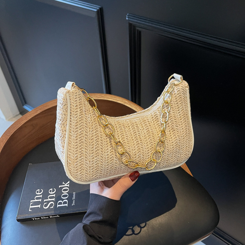 Summer New New Free Delivery Luxury Bag Designer Bag Versatile Fashion Grass Weaving Stick Underarm Simple Artistic Single Shoulder Handheld Crossbody