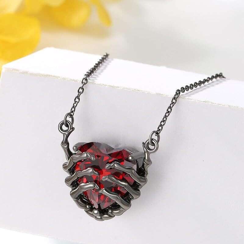 Fashionable design exaggerated punk style personality dark red heart ghost claw pendant necklace for men and women