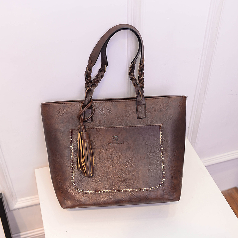 Top quality Brand High Quality fashion tassel pendant portable shoulder solid color woven Fried Dough Twists leather bag New Free Delivery Designer Ba
