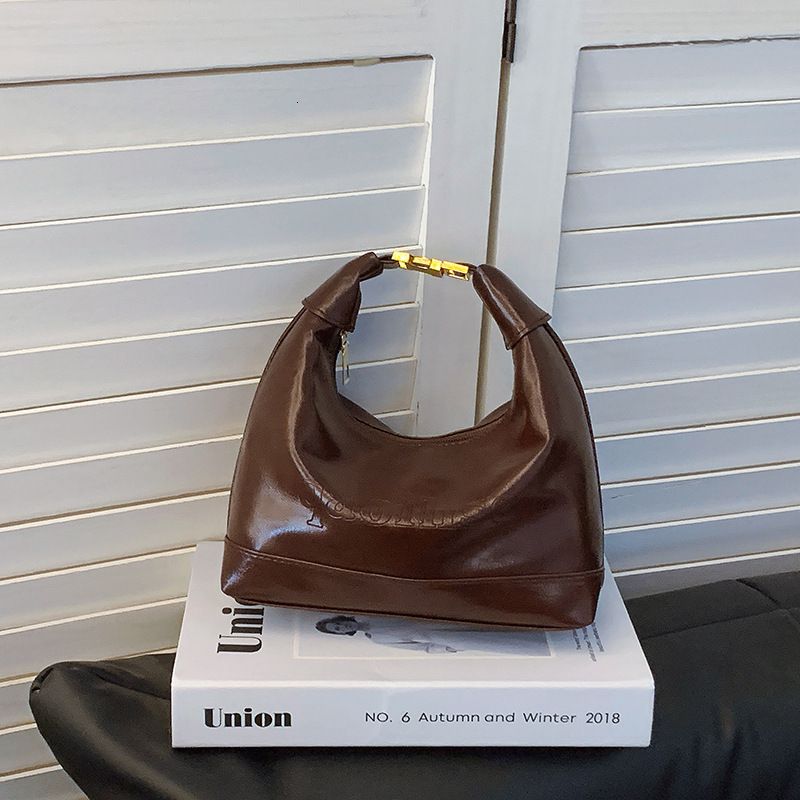 Free Delivery Designer Bag 2025 Winter New French Fashion Simple Solid Color Niche Design Armpit Shoulder Hand Dumpling Luxury Bag