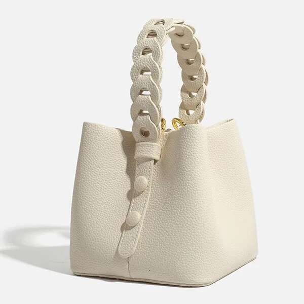New Hollowed Out Hand-Held Soft Leather Lychee Pattern Drawstring Bucket Bag, Fashionable And Versatile Women's Bag
