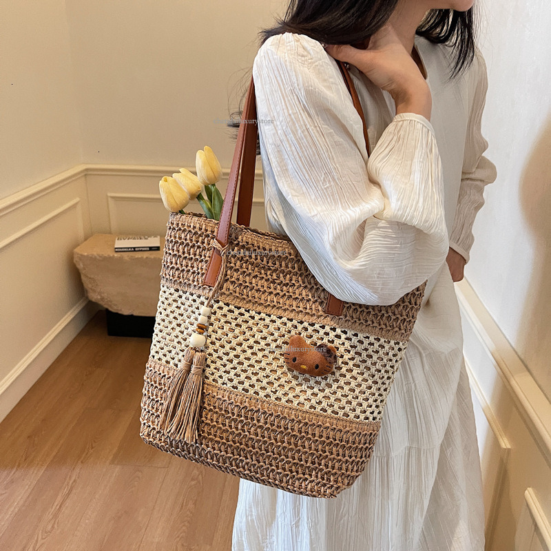 Designer Bag Women's Hollow Shoulder Strap Shoulder Bag Free Shipping New Fashion Woven Leisure Beach Bag Large Capacity Shopping Bag Vegetable B