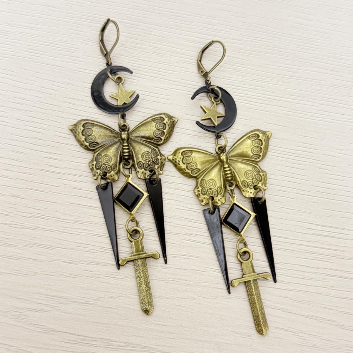 Vintage Gothic Star Moon Butterfly Sword Earrings - Unique Retro Dangle Design for Bold Fashion Statements, Available for Wholesale