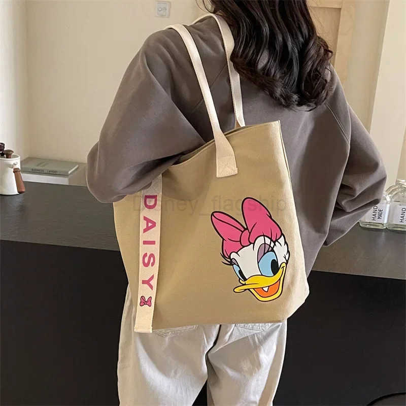 Disney Mickey Mouse New Large Capacity Cute Canvas Shoulder Bag Womens Cartoon handbag Cute storage Tote Bag Fashion MummyXJ250515
