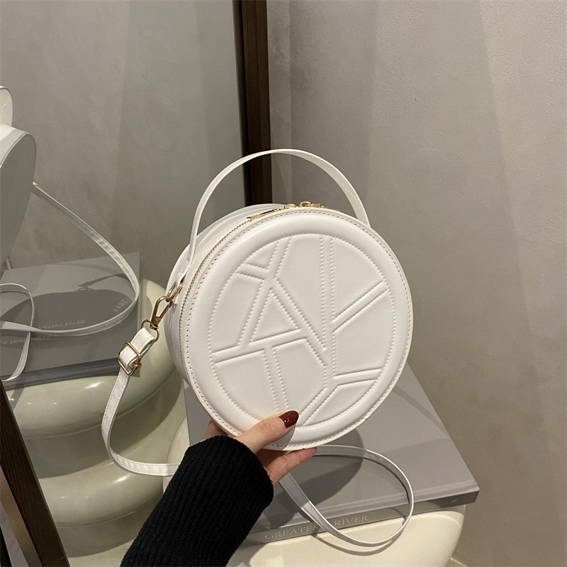 Fashion Indentation Diamond Grid Round Luxury Bag New Free Delivery Designer Bag Cake Handbag Simple Women's 2025 Spring/summer New Korean Versio