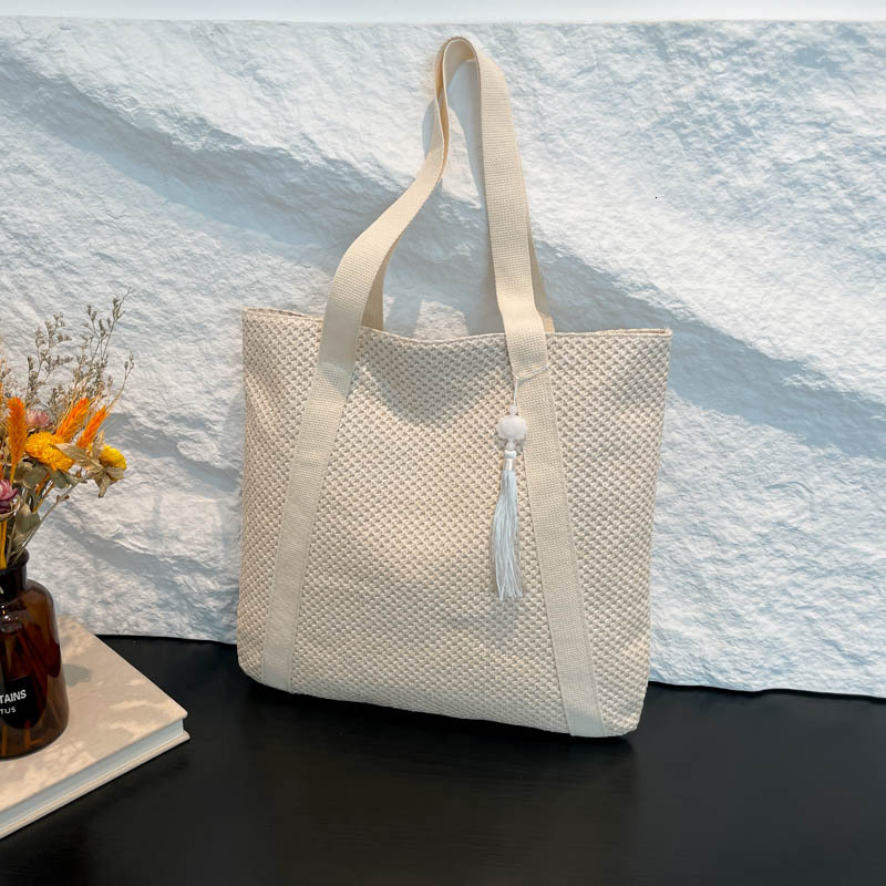 2025 Fashion Straw Women's New New Free Delivery Designer Bag Versatile Large Capacity Luxury Bag Commuter Shoulder Tote Beach Woven Bag