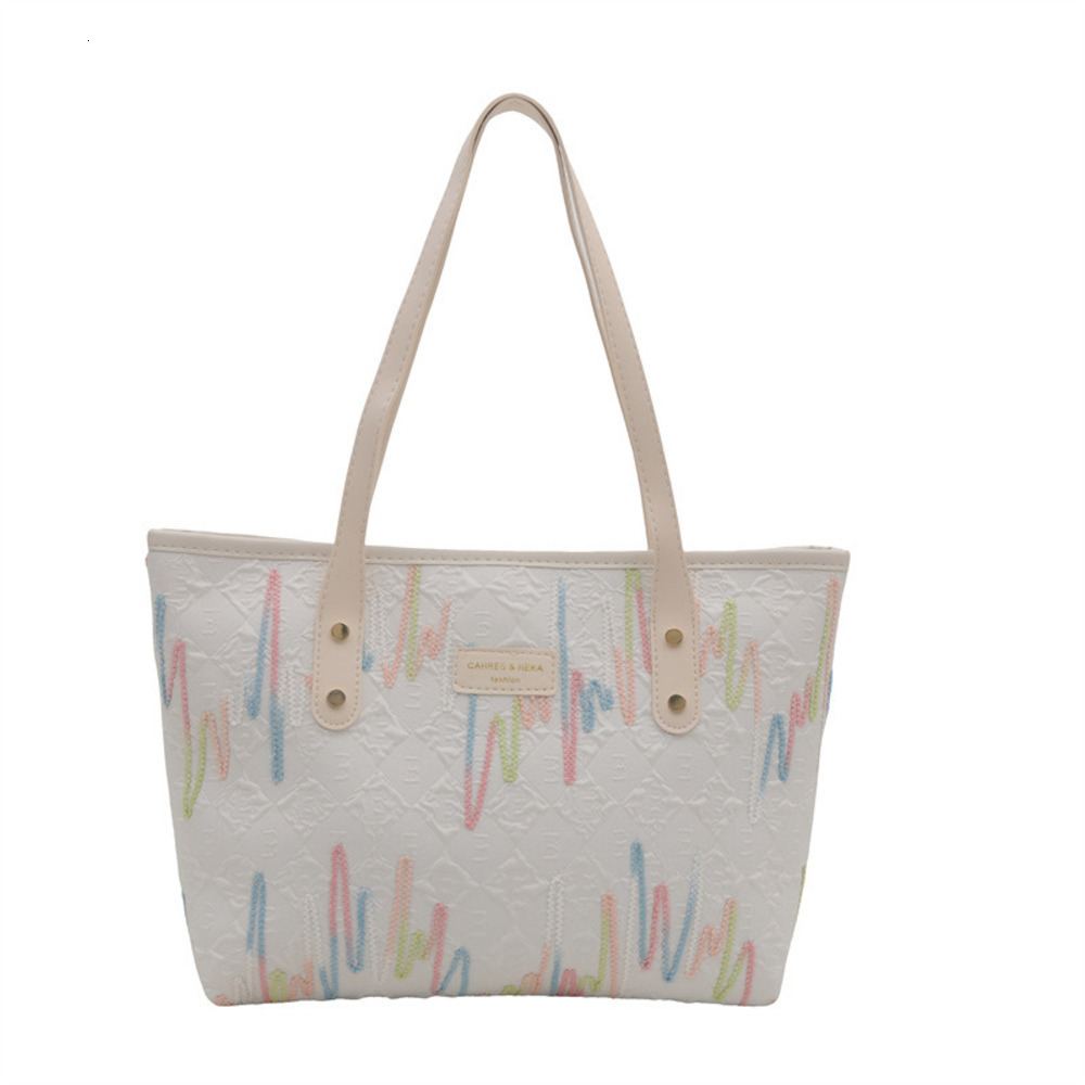 Handheld large capacity tote for women in autumn and winter 2025, new color blocking casual striped versatile high-end shoulder bag