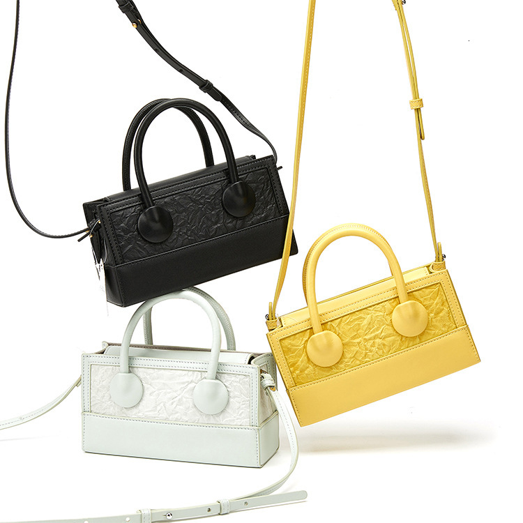 High quality brand, brand new, free delivery design bag, niche design candy color box, handheld shoulder crossbody bag, mobile chain bag