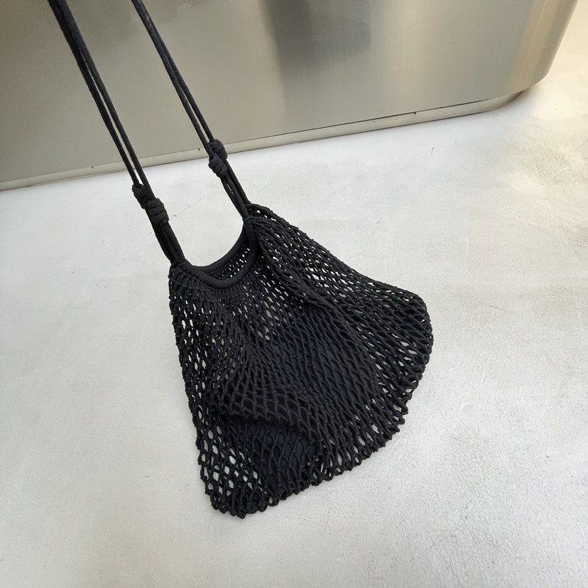 2025S designer hollow women grass new internet famous large capacity seaside vacation woven casual shoulder tote baozi mother bag