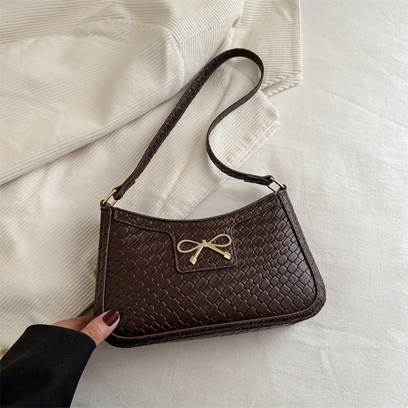 Sweet Girl Heart New Free Delivery Designer Bag Weaving Pattern 2025 Spring New Simple Fashion Western Luxury Bag Style Bow Armband Shoulder Bag Premi