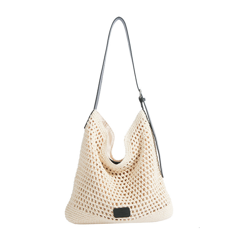 2025 new hollow woven large capacity forest lazy feng shui bucket for women, simple vacation style single shoulder crossbody bag