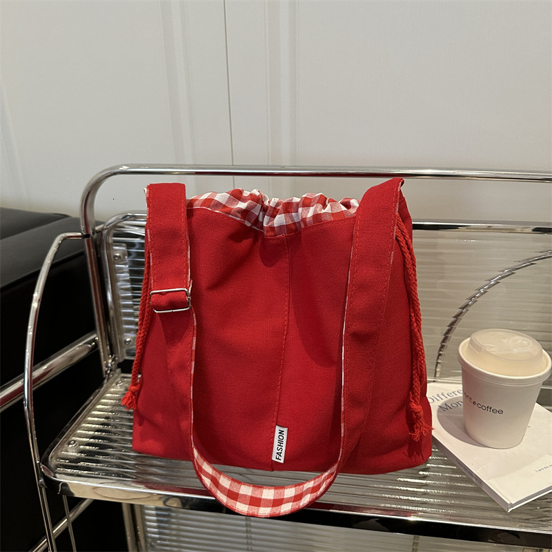 New bag multifunctional 2025 new fashionable drawstring designer handbag commuting leisure student single shoulder women's crossbody bag