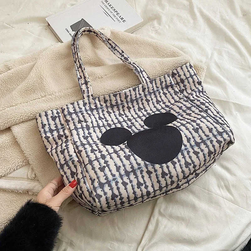 Disney New Womens Canvas Handbag Large Capacity Shoulder Bag Cute Armpit Mommy Niche Shopping BagXJ250515