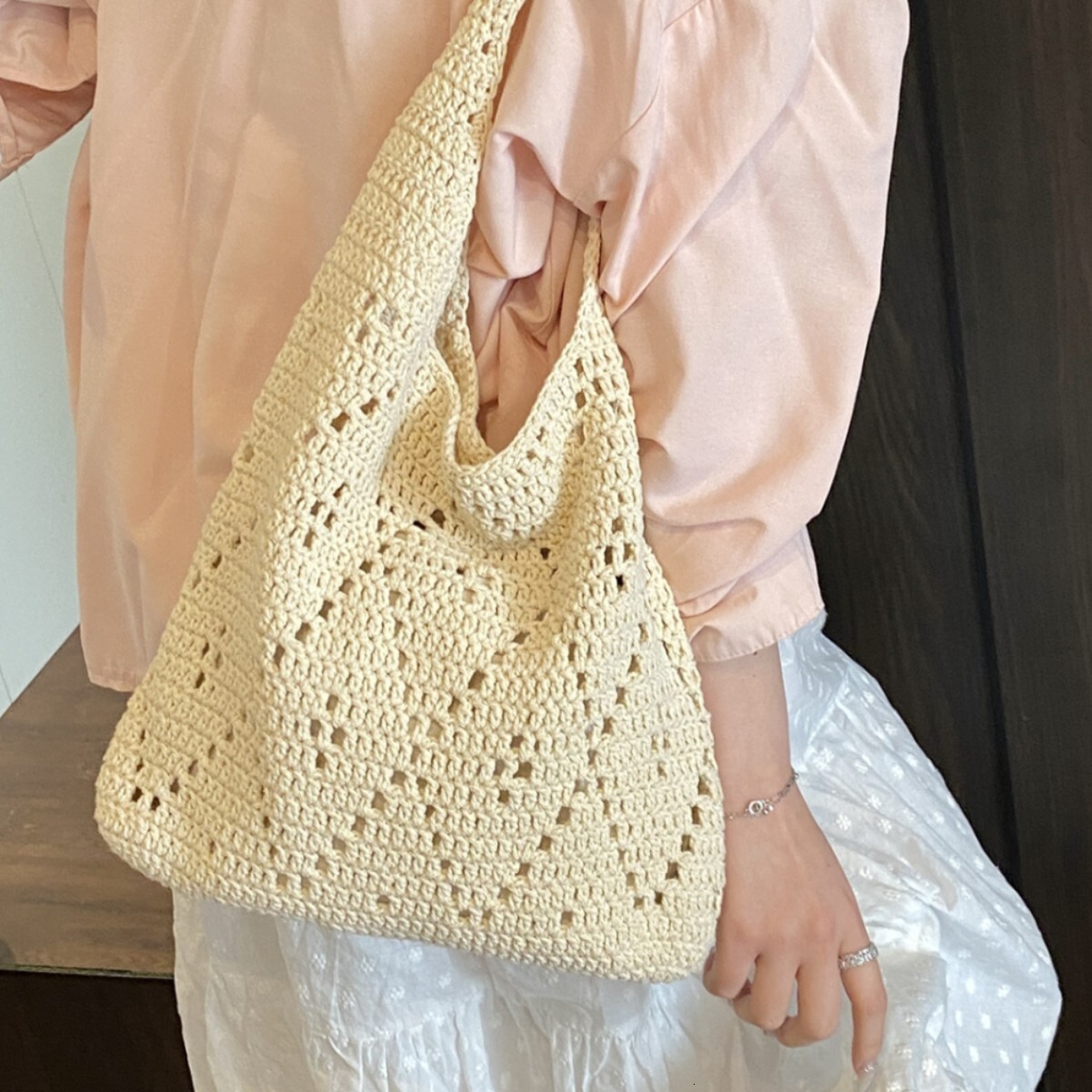 New French style artistic hollow weaving large capacity tote bag crochet shoulder bag fairy vacation handheld beach bag lazy and simple designer shoul