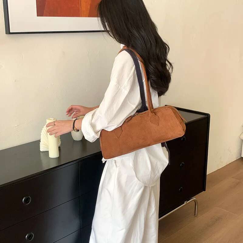 2025 Women's Sausage New Retro Frosted Cowhide Suede Niche Commuting Armpit French Stick Bag