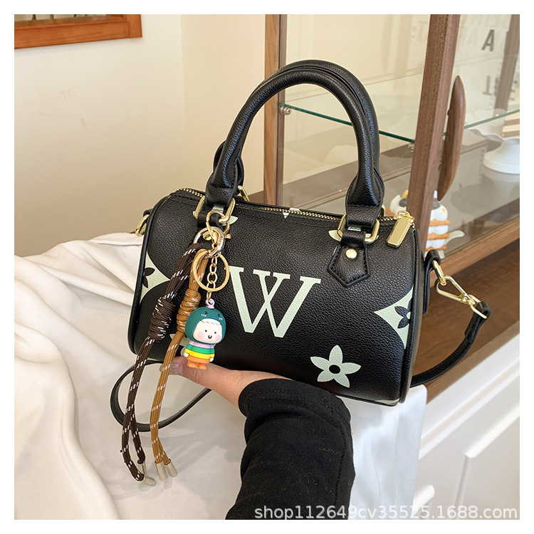 Premium sense of printing handbag 2025 new retro old flower letters women's bag hundred crossbody bag trend pillow bag