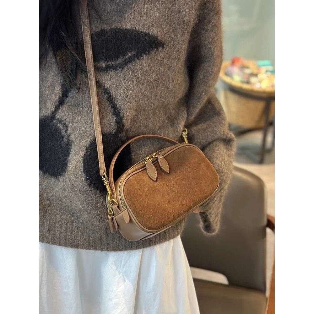 Small handbag 2025 new niche crossbody hand-held fashionable cowhide versatile leather women's bag