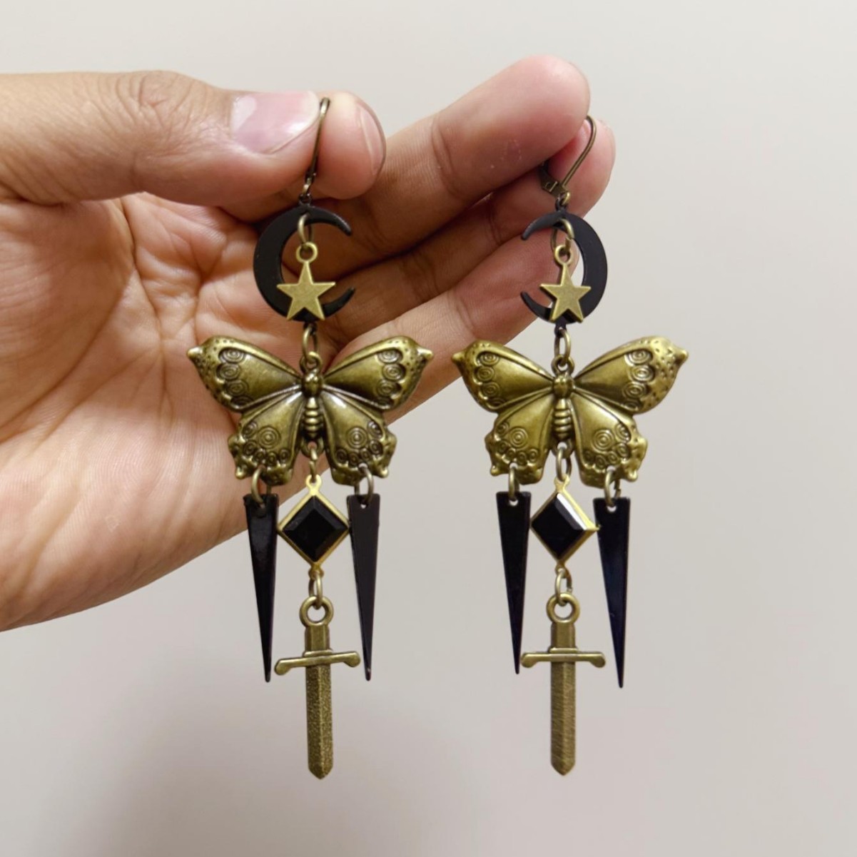 Vintage Gothic Star Moon Butterfly Sword Earrings - Unique Retro Dangle Design for Bold Fashion Statements, Available for Wholesale