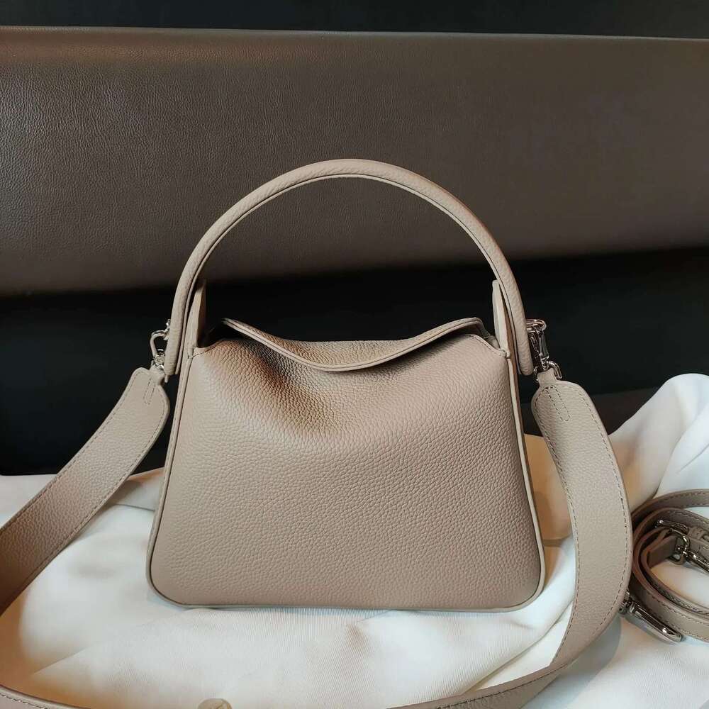 Genuine women's with large capacity and unique cigarette box design Made of soft leather one shoulder crossbody bag