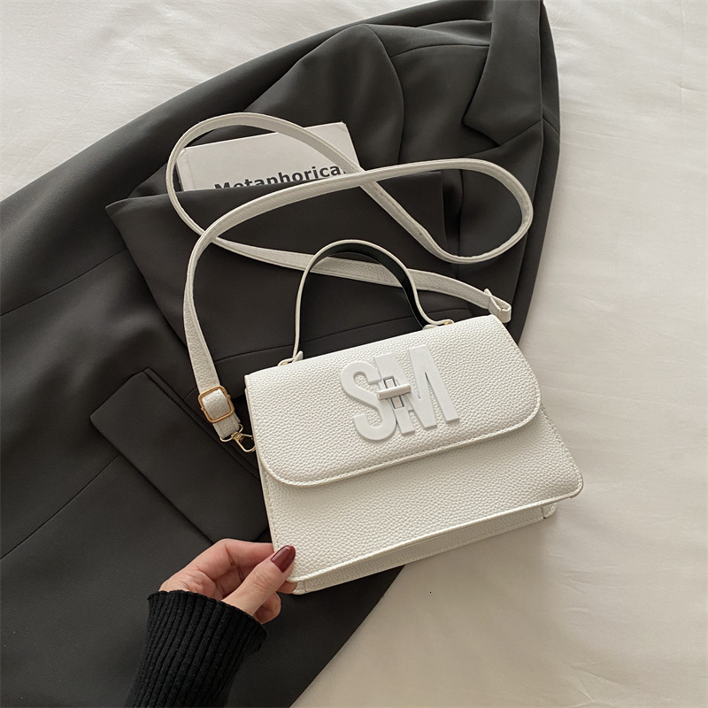 Free Delivery Designer Bag 2025 New Solid Color Simple And Atmospheric Small Square Large Capacity Casual Hand Korean Version Commuting Crossbody Luxu