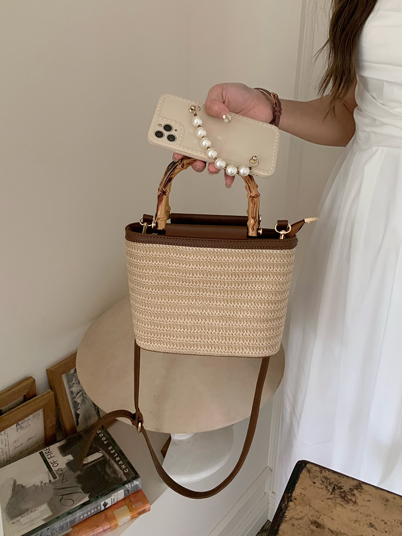 New bag for summer 2025, niche slanted designer, women's premium retro texture, hand-held straw bucket bag, women's armpit bag