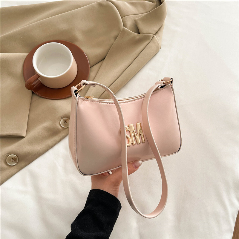 Western Women's 2025 Luxury Bag Summer New Style Texture Popular Letter Commuting Handheld New Free Delivery Designer Bag Crossbody Bag Trend