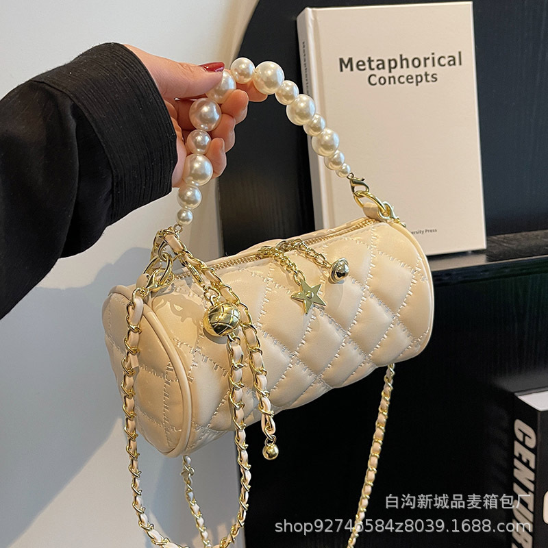 New summer single shoulder womens new pearl chain handbag simple and fashionable designer crossbody bag trendy cylindrical bag niche popular handbag c