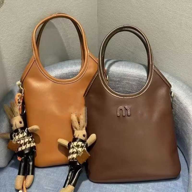 designer bag tote bag sling bag women Mini first layer cowhide Light Luxury Casual High Miu Family 2025 Versatile End Simple Handheld Crossbody Summer Sale