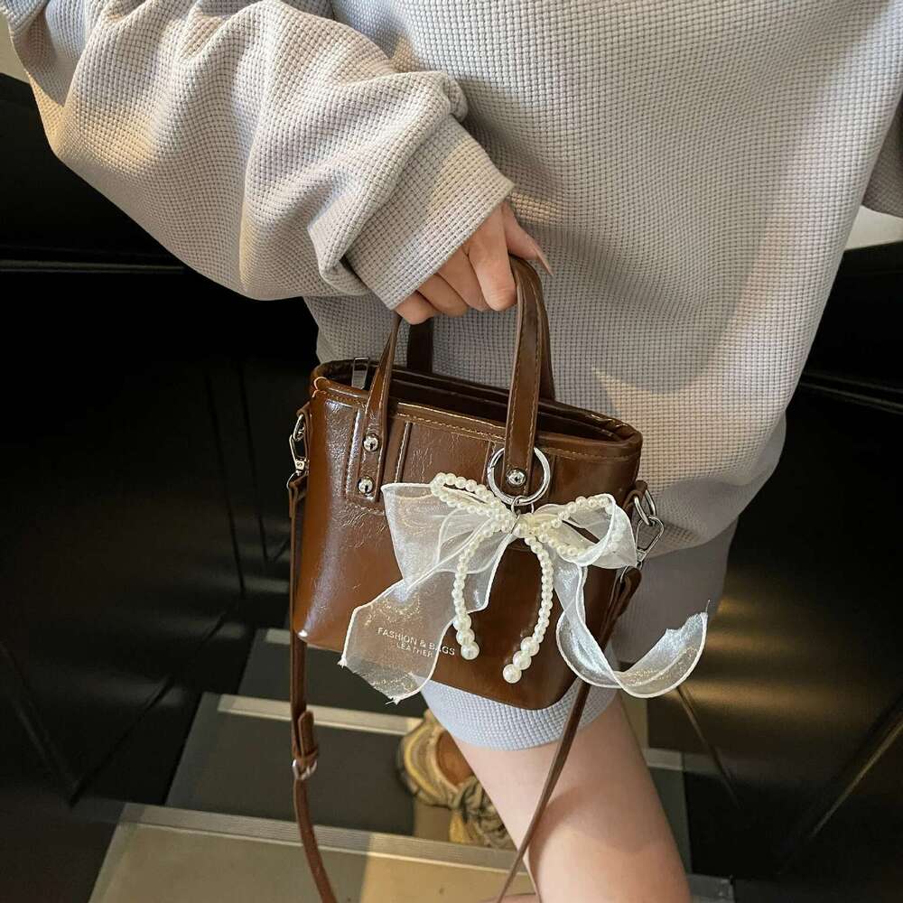 Niche Design Contrasting Color Portable Bucket Women's 2025 New Simple Shoulder Fashion Casual Commuter Messenger Bag