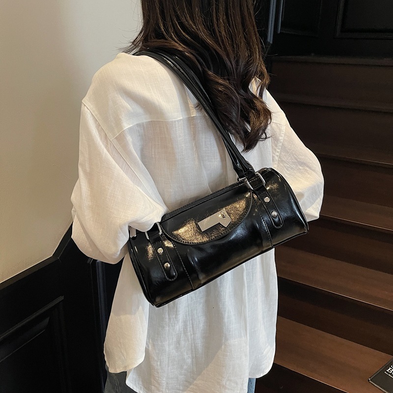 Rivet motorcycle hand-held Boston for women 2025 new niche design versatile single shoulder armpit bag