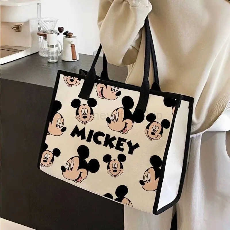 Disney New Large Capacity Cartoon Canvas Bag Womens 2024 New Fashion Outing Portable Shopping Bag Mommy Shoulder Tote BagXJ250515