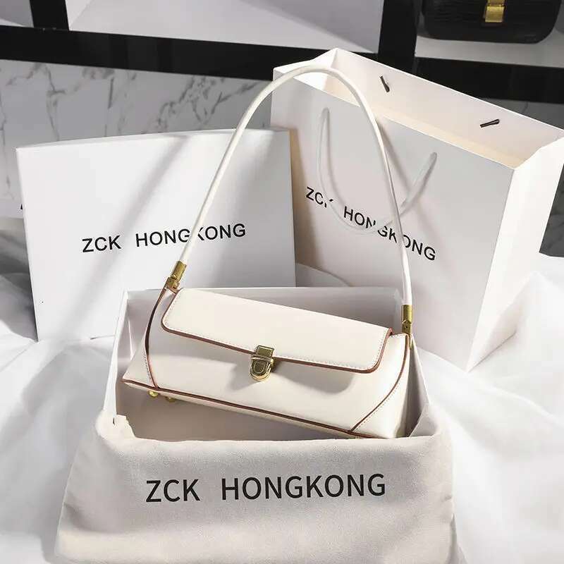 Armpit Retro Niche Design High-End Solid Color One-Shoulder Portable Genuine Leather Women's Bag Spring And Summer Versatile