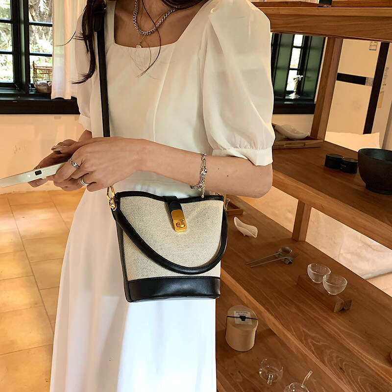 Niche retro for women 2025 high-end versatile, portable bucket spliced single shoulder crossbody bag, women's handbag new style, unique and elega