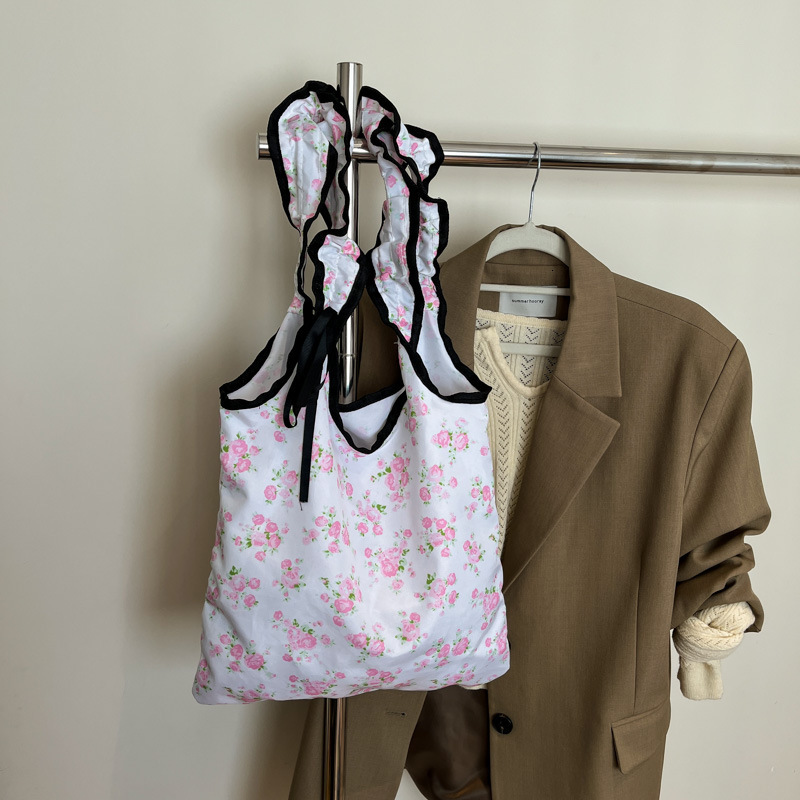 2025 New Sweet And Cute Folded Shoulder Summer Small Fresh Wave Point Bow Luxury Bag Cloth New Free Delivery Designer Bag Commuter Bag For Women